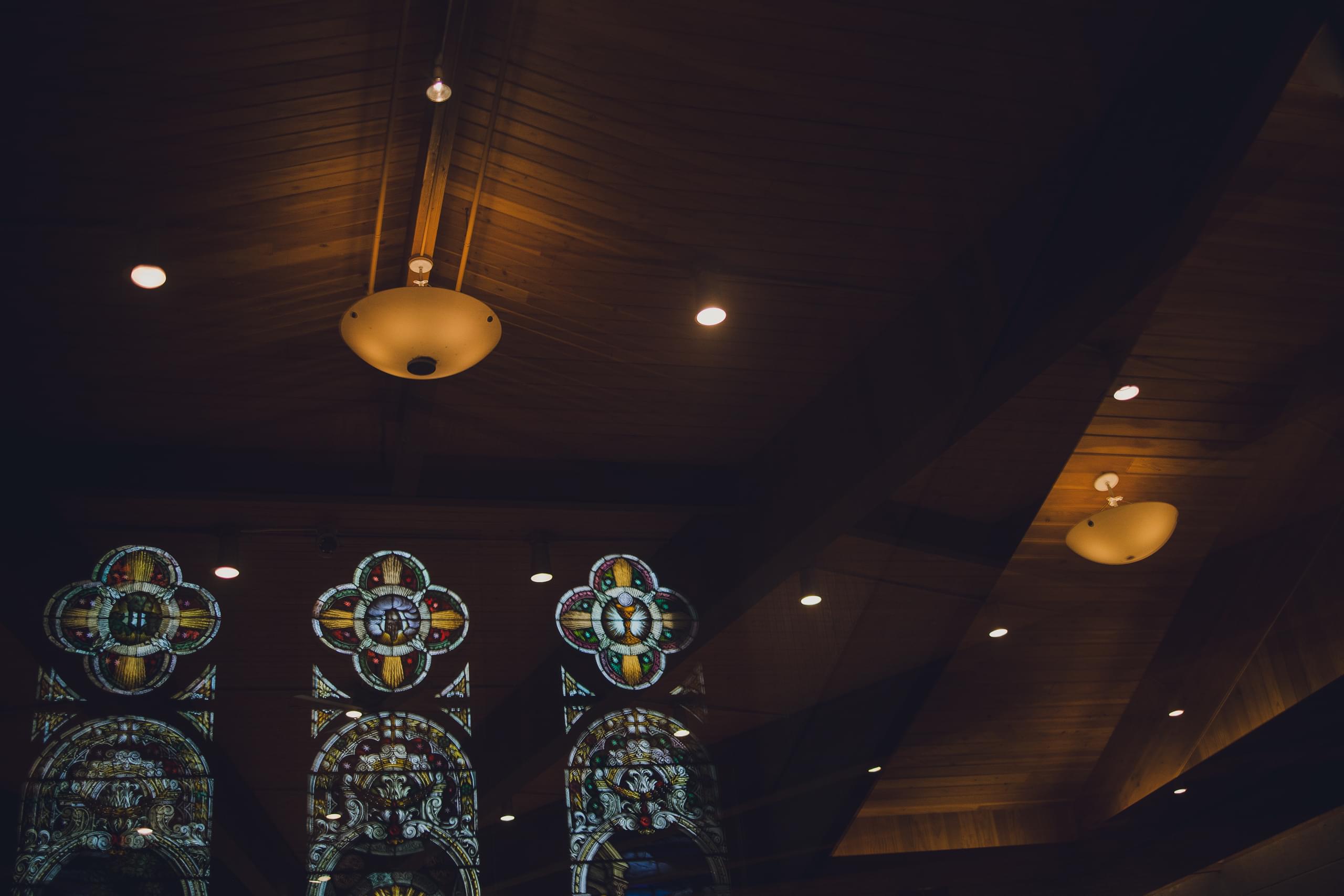 St. Benedict's Cathedral windows at Megan and Aaron's wedding ceremony venue.