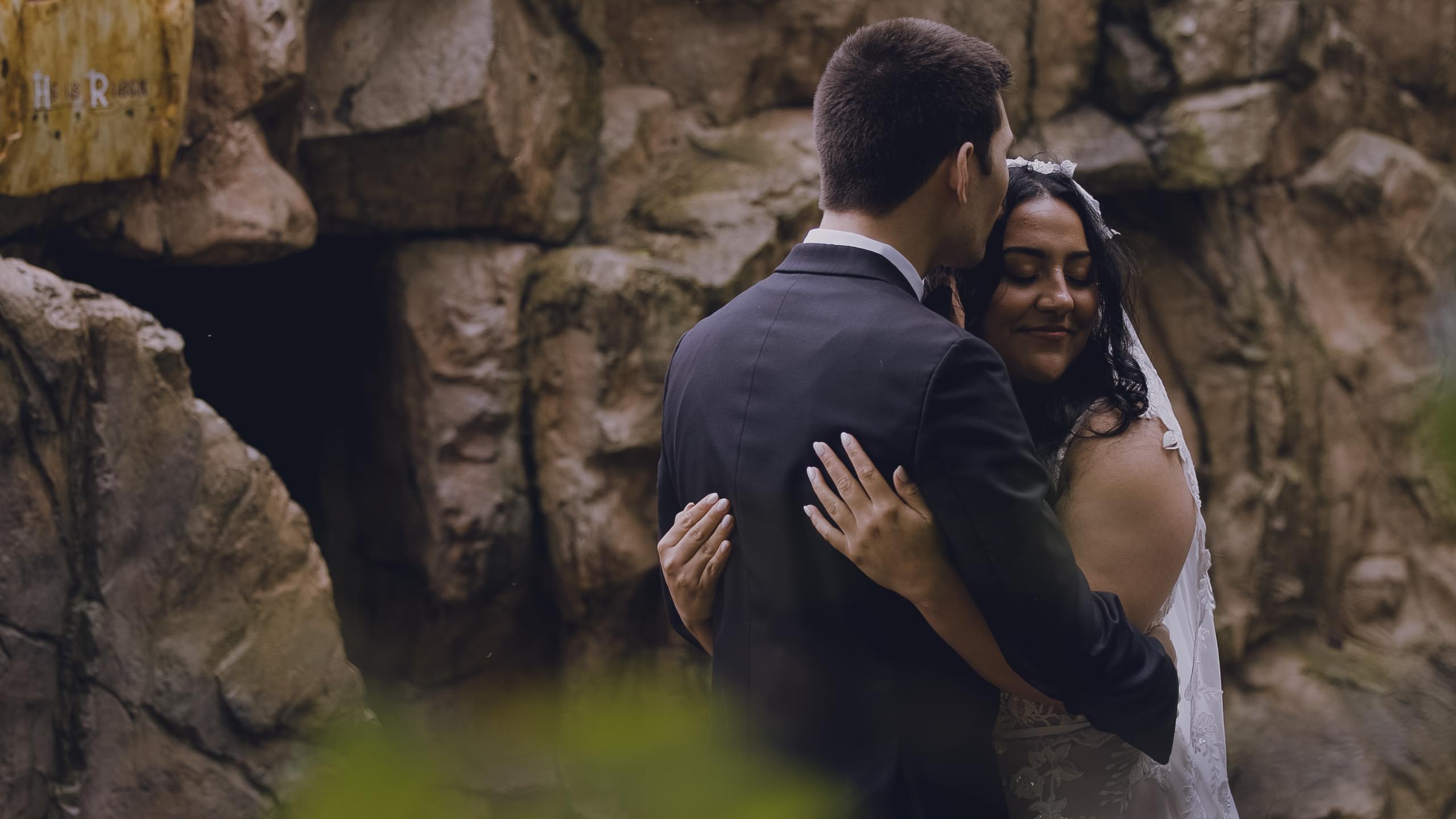 Megan and Aaron's first look in the gardens of the St. Benedict's Catholic Church