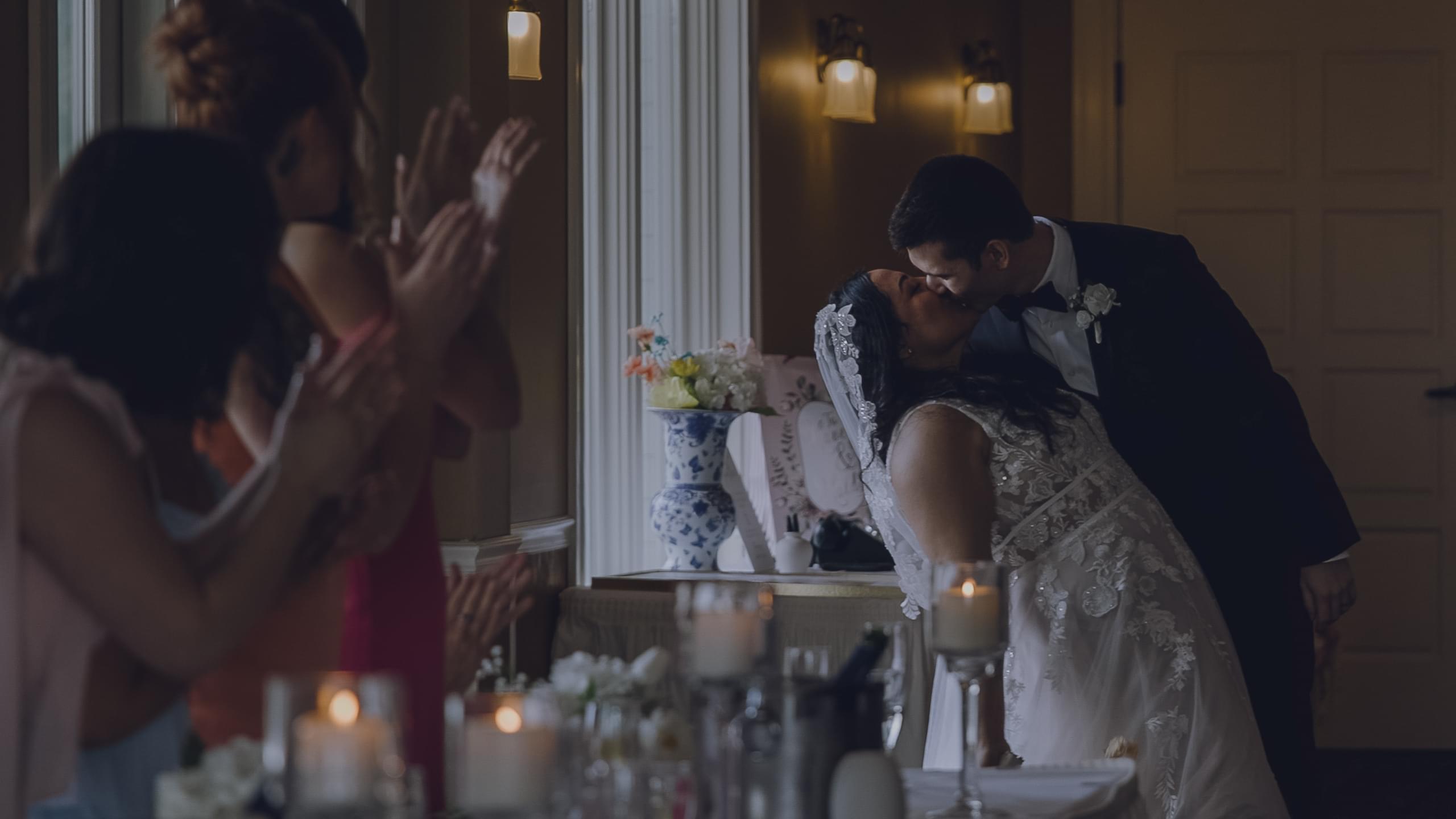 Megan and Aaron's dip kiss during the grand entrance at the Northland Country Club