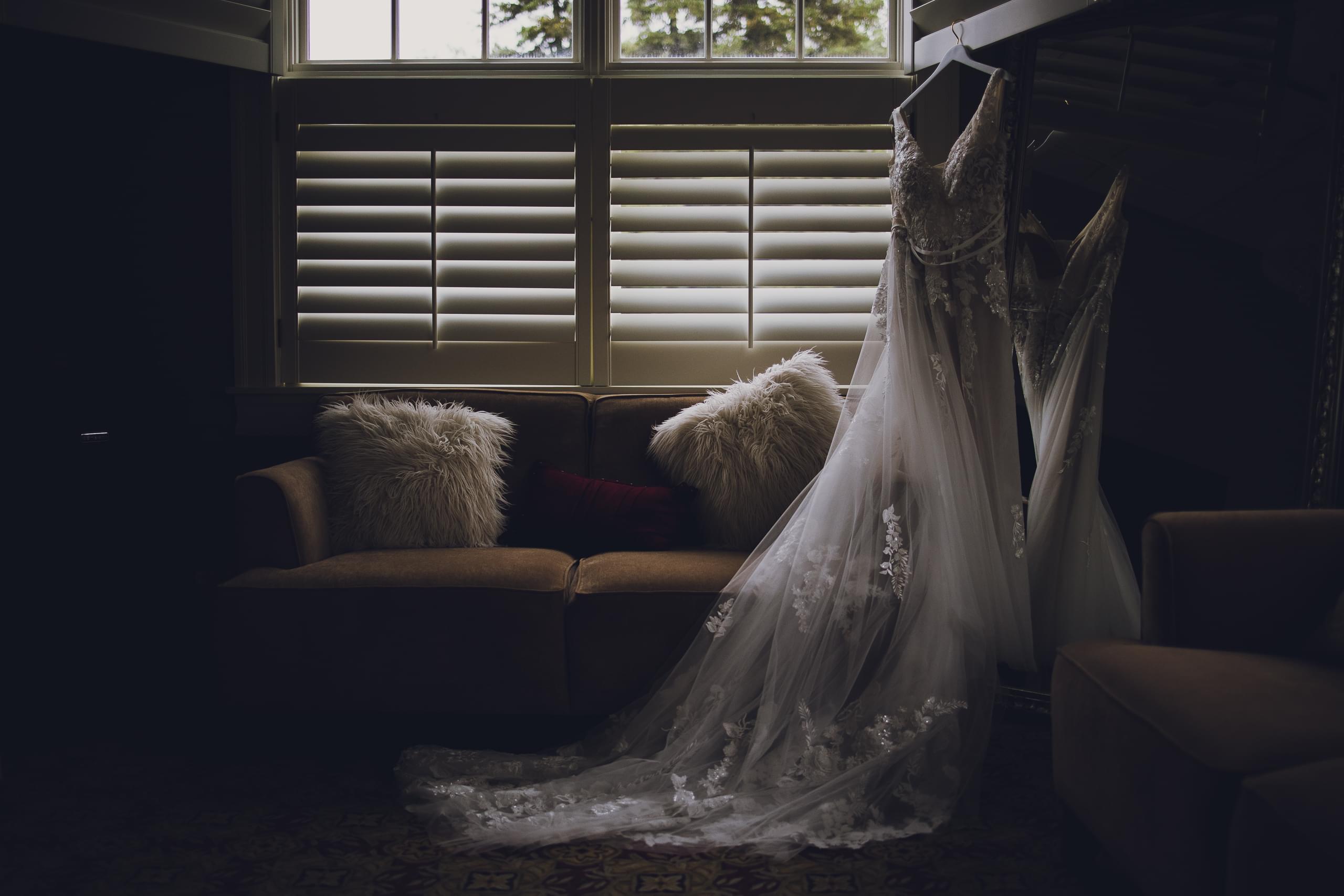 Megan's wedding dress hanging in the bridal suit at Northland Country Club