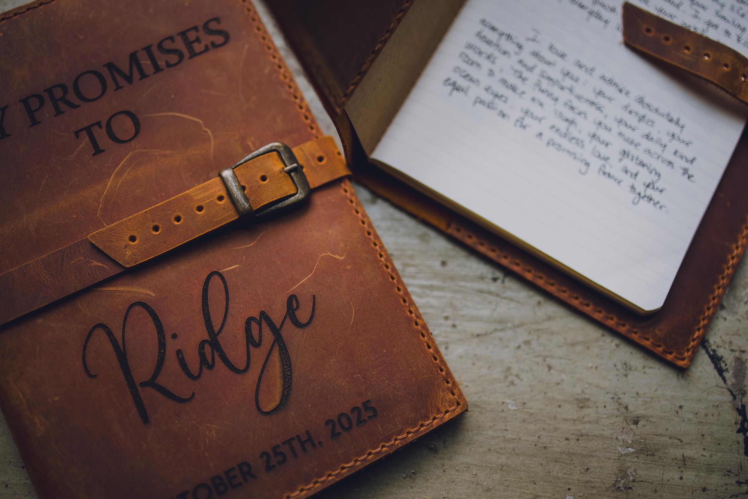 Wedding detail shots featuring Bryce and Ridge's vow books